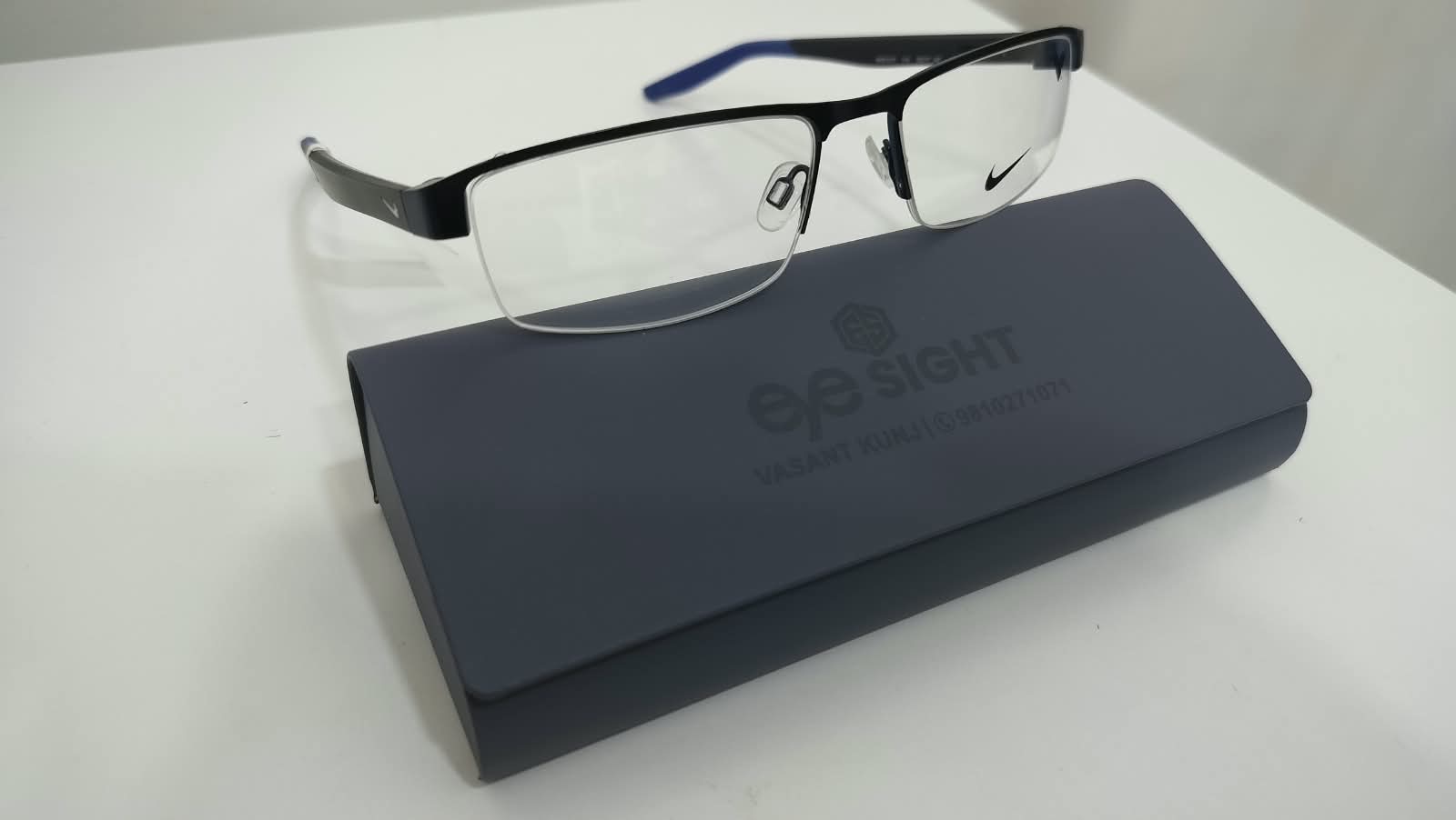 Nike black and blue half-rim frame at Eye Sight