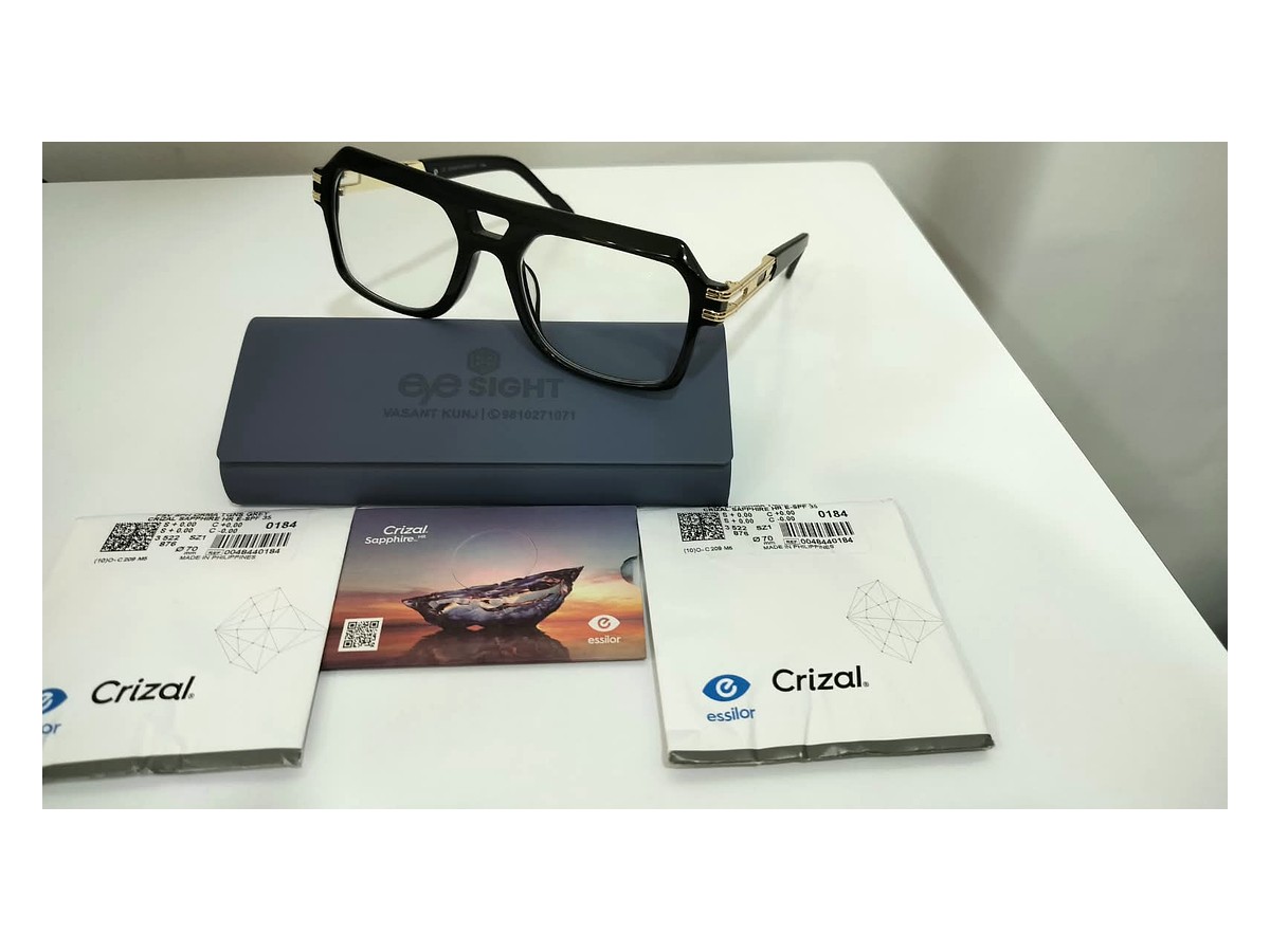 Black optical frame with Crizal lens packaging at Eye Sight
